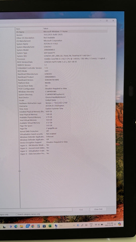 6980987